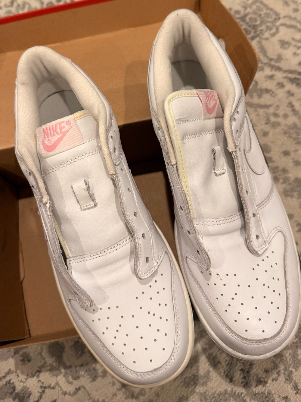 Nike Men’s White Low-Top Sneakers with Pink Logo